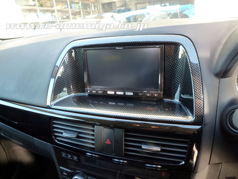 CX-5 CARBON LOOK CENTER AUDIO PANEL